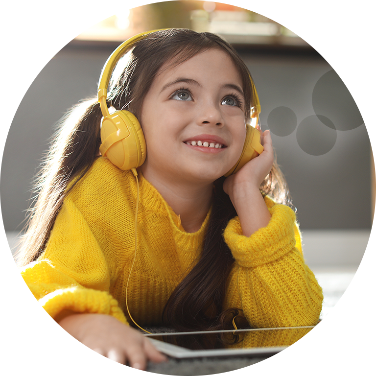 Little girl happily listening